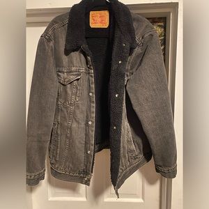 Men’s extra large black denim jacket fleece lined. Nearly new.